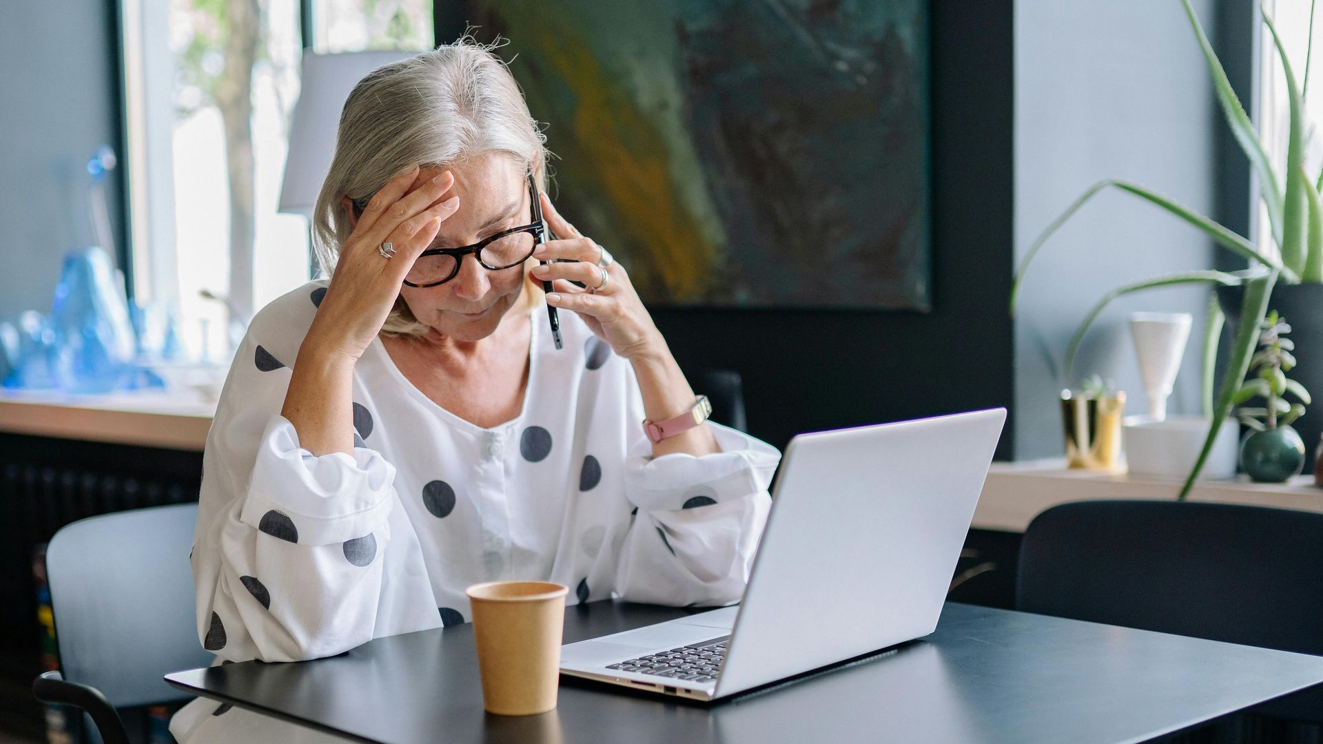 A caregiver researching cancer treatment options